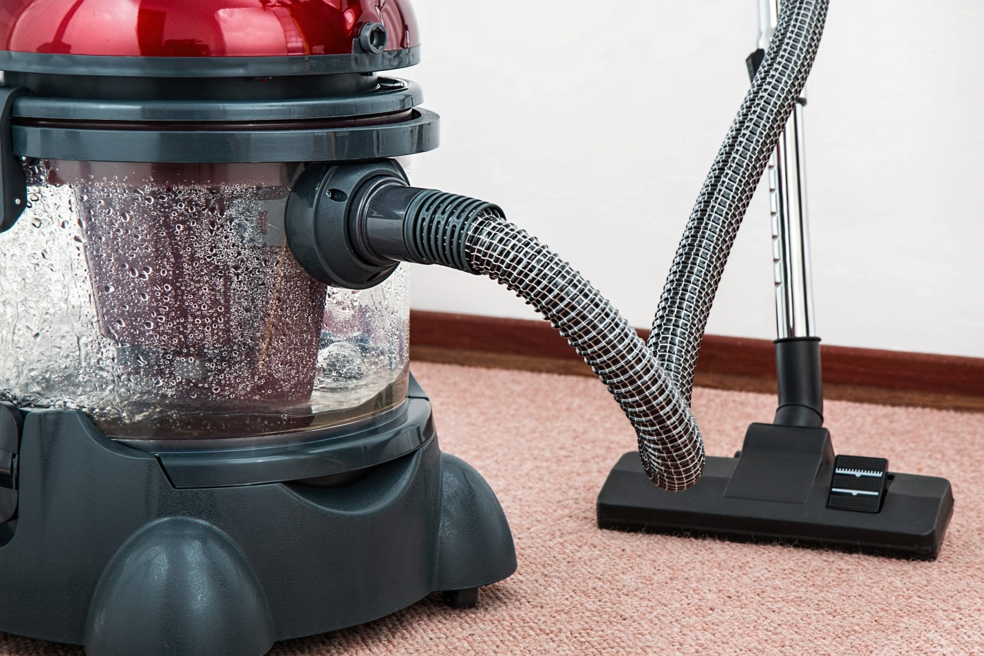 A vacuum cleaner in a room